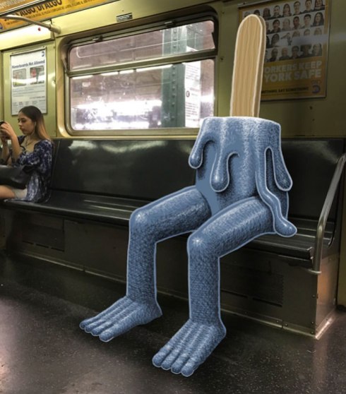 artist-adds-monsters-next-to-strangers-on-the-subway-34
